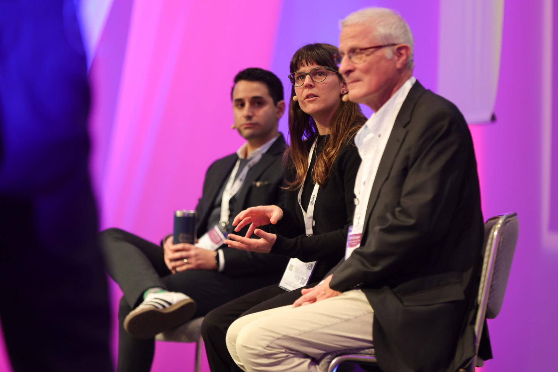 People discussing on a panel at the 29th IAKS congress